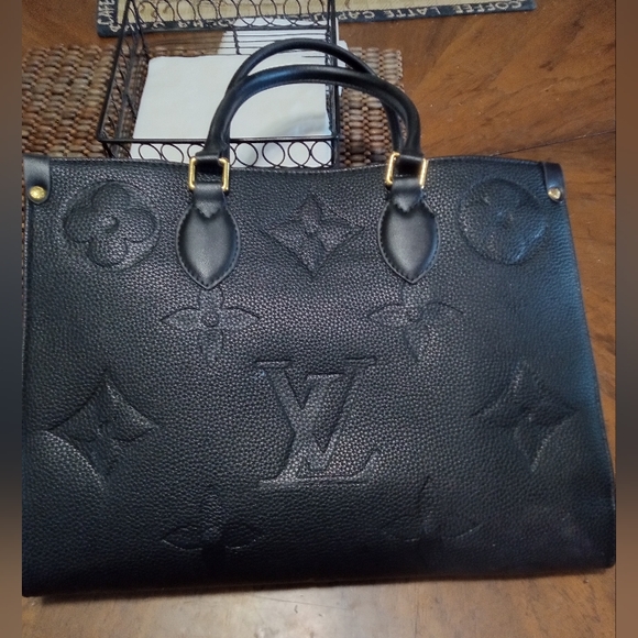 Louis Vuitton "On the go" bag - Picture 1 of 2